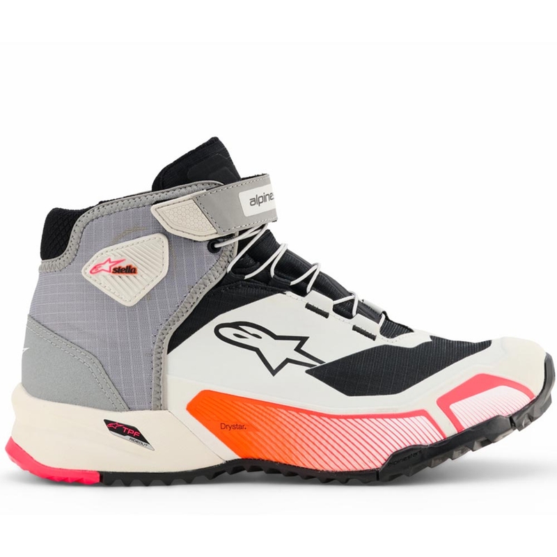 Alpinestars Stella CR-X Drystar motorlaarzen voor dames in de kleuren wit, lichtgrijs, zwart en fluorescerend roze.