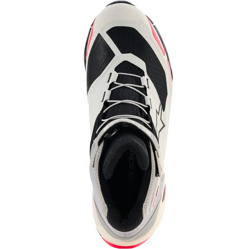 Alpinestars Stella CR-X Drystar motorlaarzen voor dames in de kleuren wit, lichtgrijs, zwart en fluorescerend roze.