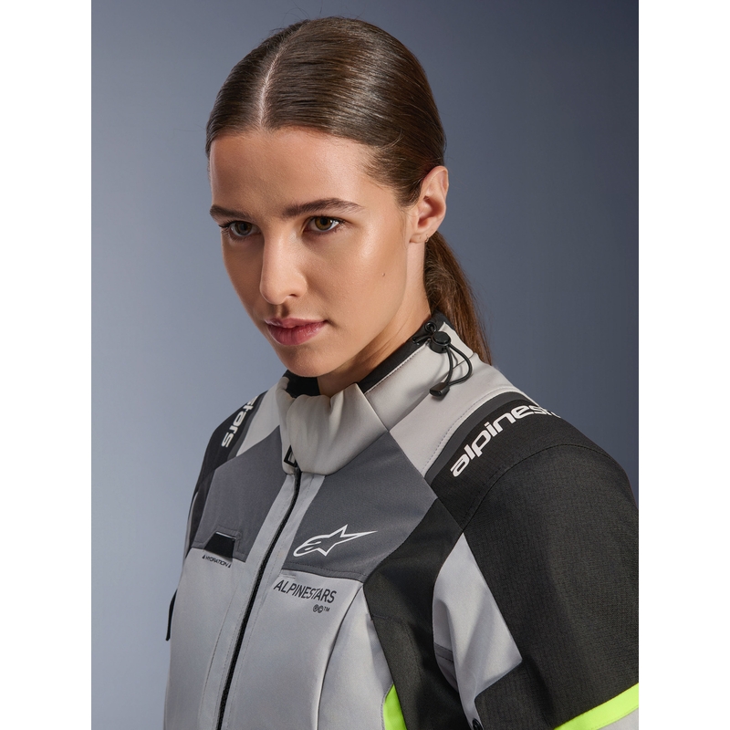 Alpinestars Stella Andes V4 Drystar dames motorjas in de kleuren donkergrijs-lichtgrijs-zwart-fluorescentiegeel.