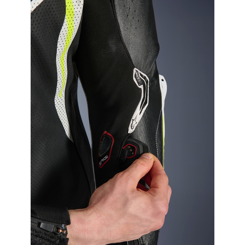 Alpinestars GP TECH V5 eendelig leren motorpak in zwart-wit-fluorescentiegeel
