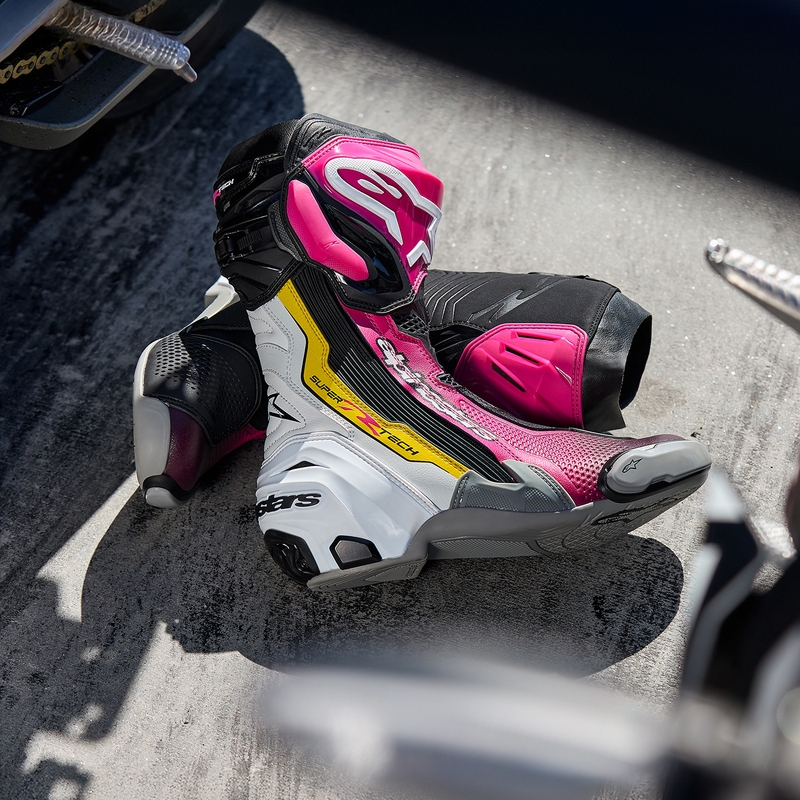 Alpinestars Supertech R motorlaarzen zwart-wit-roze-geel
